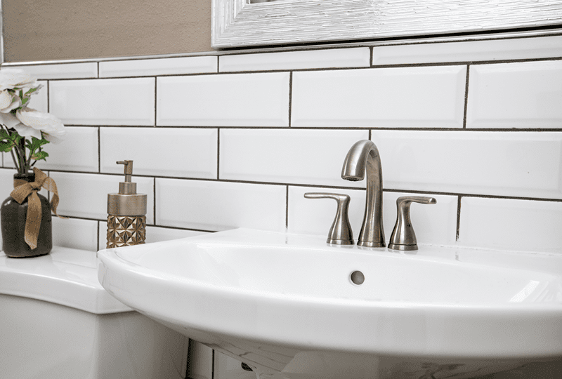 Large Tiles work well in the Bathroom to make the space look larger