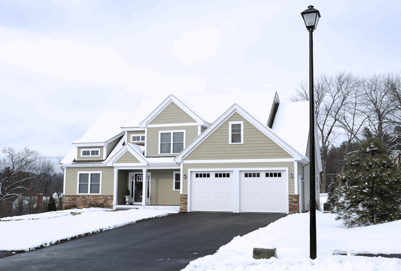 Homeowner tips, are heated driveways worth it. Home and driveway in the winter.