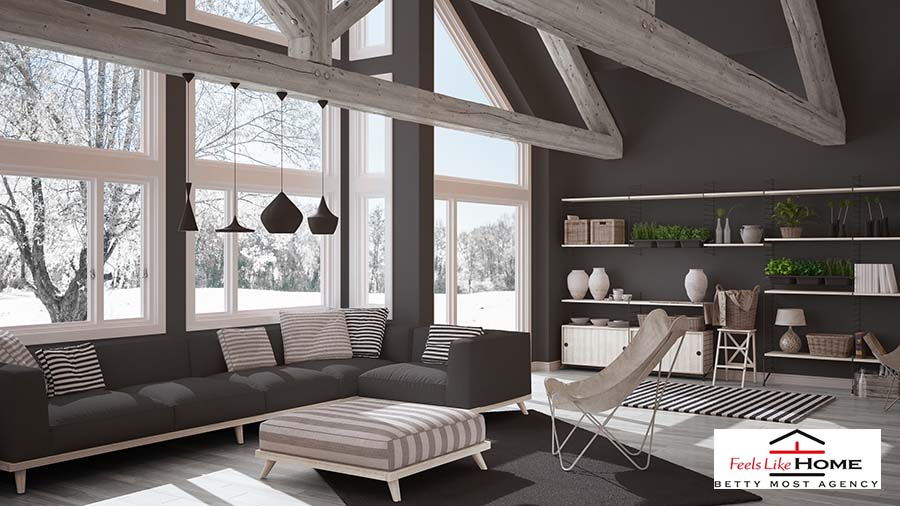 Open space home with large front windows in the winter