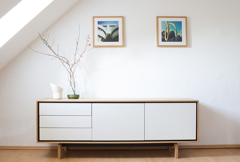 Mid-Century Modern Design , white and wood credenza against white wall