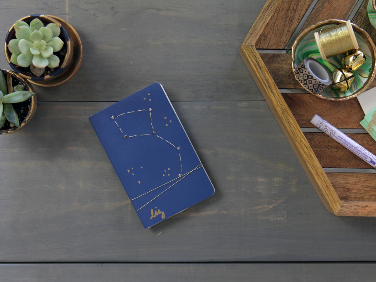 Blue notebook on grey wood table