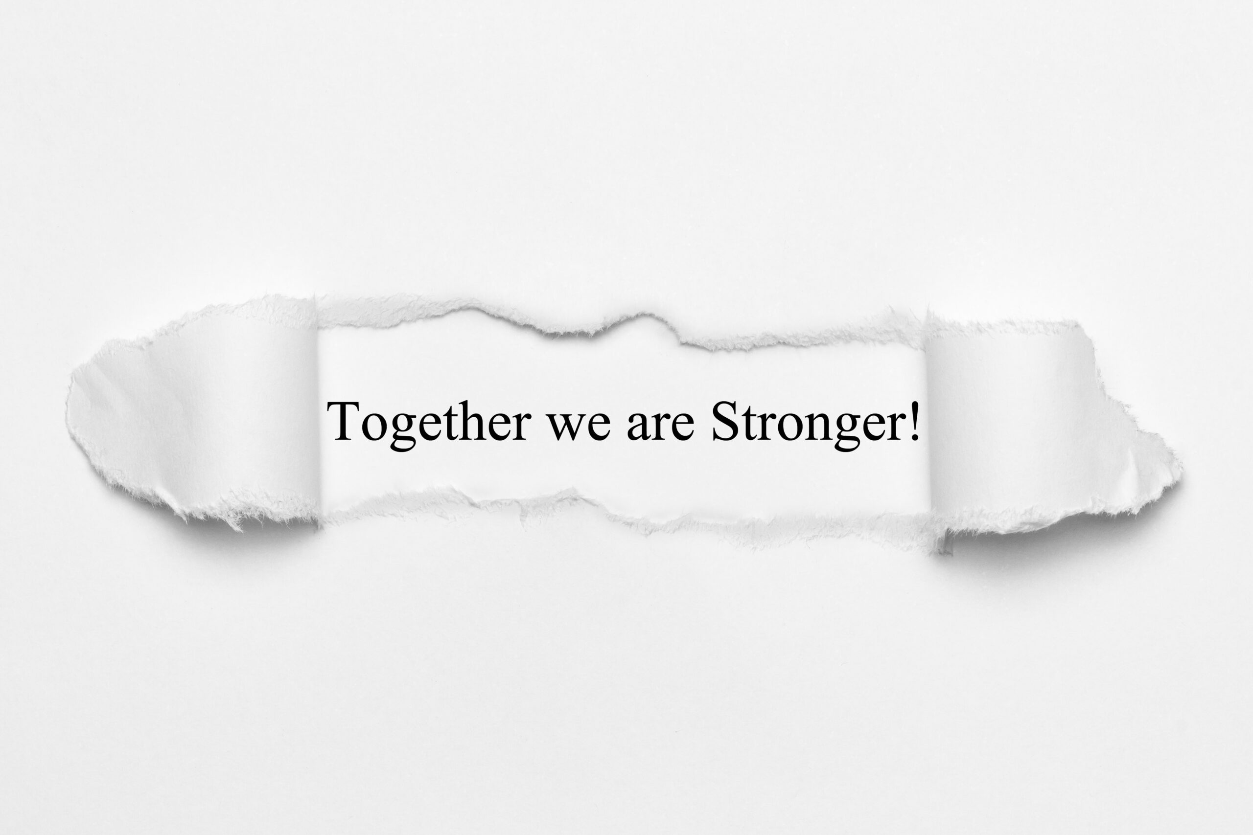 White paper, torn open - together we are stronger