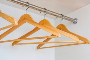 wooden hangers in a closet, organization, 